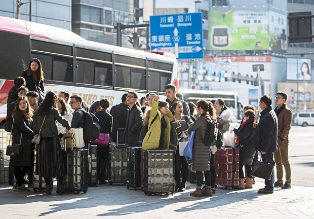 Trung Quốc tạm ngừng chương trình miễn thị thực cho du khách Nhật Bản